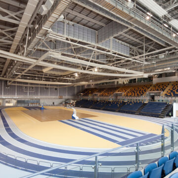 Indoor track hall in Glasgow International Arena, large beams visible